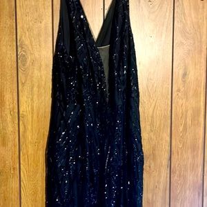 David’s bridal all over sequined black jumpsuit. Perfect for Prom. Has pockets.